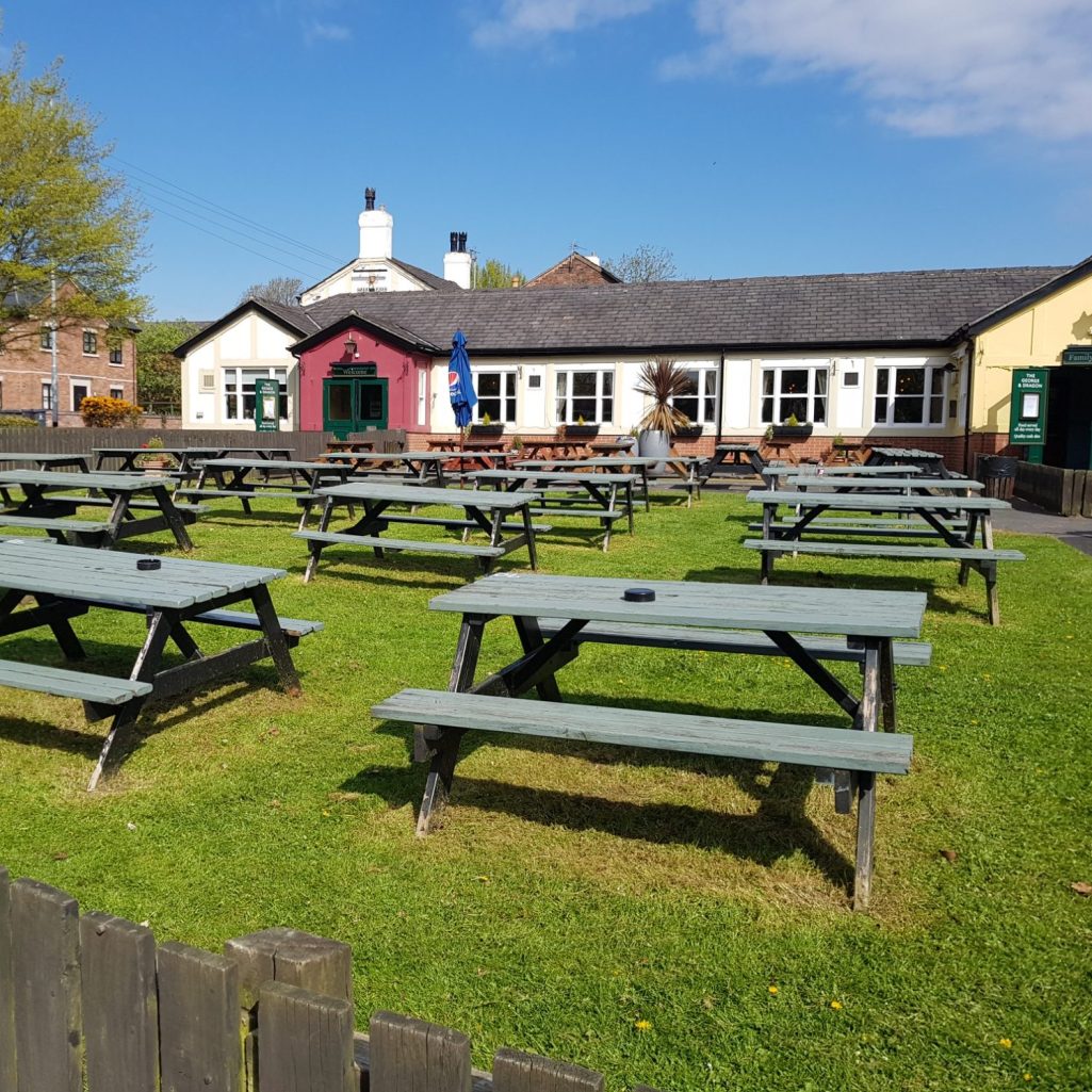 A pub after receiving a visit from a local commercial gardener